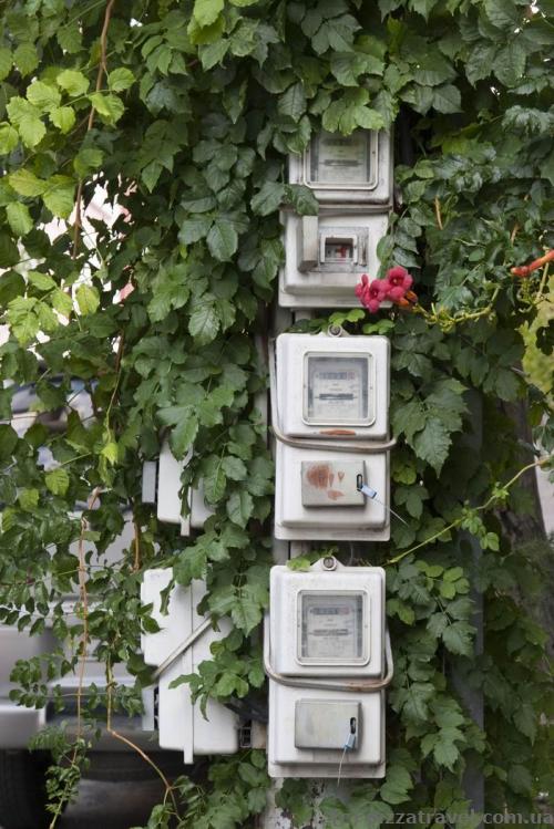 Electricity meters hang right on the street.