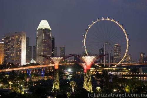 Gardens by the Bay and ferris wheel in Singapore